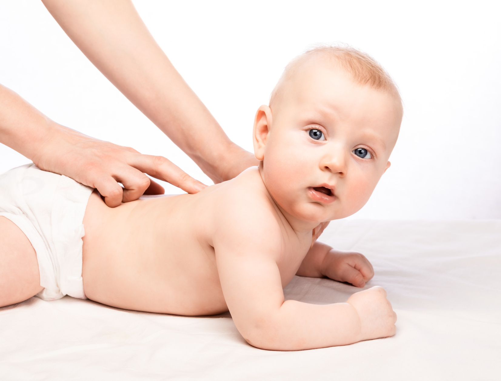 Child Receiving Back Massage in Pediatric Clinic
